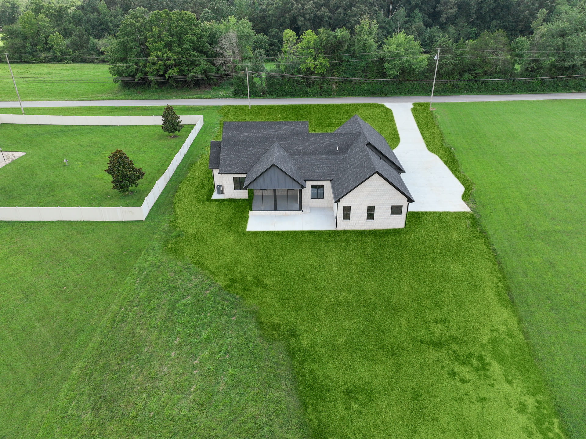 A Farmhouse-Style New Build with an Oversized Garage